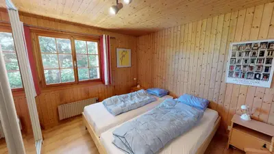 Ein Bett oder Betten in einem Zimmer der Unterkunft Saxo