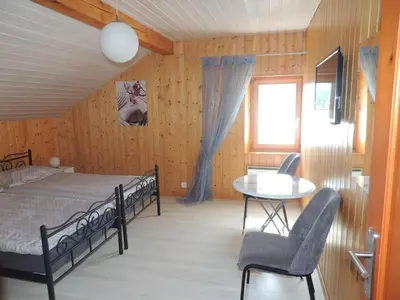 Ein Bett oder Betten in einem Zimmer der Unterkunft Chambre d'hôte du Moulin