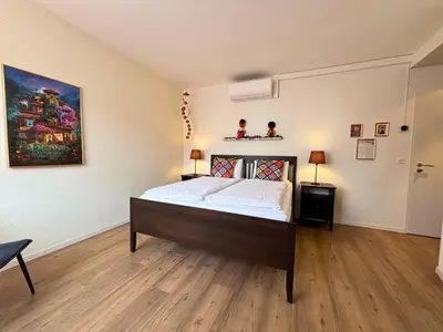 Ein Bett oder Betten in einem Zimmer der Unterkunft Hotel Movieworld