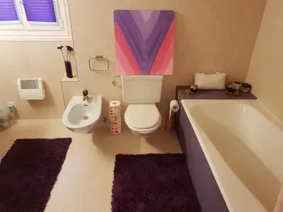 Ein Badezimmer in der Unterkunft Appartamento via Luina