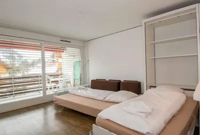 Ein Bett oder Betten in einem Zimmer der Unterkunft Ferienwohnung Studio Selvea