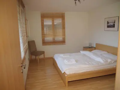 Ein Bett oder Betten in einem Zimmer der Unterkunft Ferienwohnung Schützenrain
