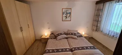 Ein Bett oder Betten in einem Zimmer der Unterkunft Apartment Sunshine