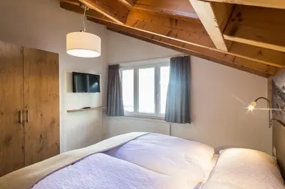 Ein Bett oder Betten in einem Zimmer der Unterkunft Apartments Patricia