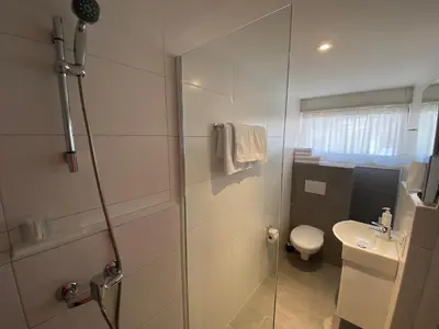 Ein Badezimmer in der Unterkunft Hotel Twing
