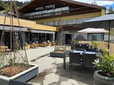Ein Restaurant oder anderes Speiselokal in der Unterkunft Hotel Twing