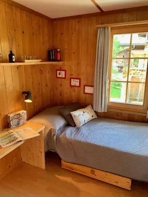 Ein Bett oder Betten in einem Zimmer der Unterkunft Chalet Butterfly