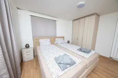 Ein Bett oder Betten in einem Zimmer der Unterkunft Haus Astoria