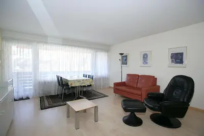 Ein Sitzbereich in der Unterkunft Apartments Haus Quelle