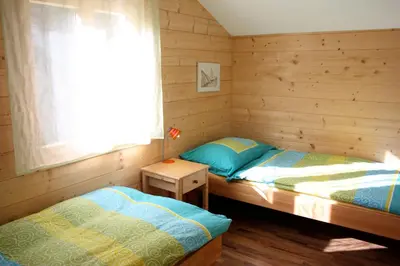 Ein Bett oder Betten in einem Zimmer der Unterkunft Chalet Samson