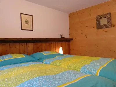 Ein Bett oder Betten in einem Zimmer der Unterkunft Chalet Samson