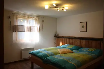 Ein Bett oder Betten in einem Zimmer der Unterkunft Chalet Samson