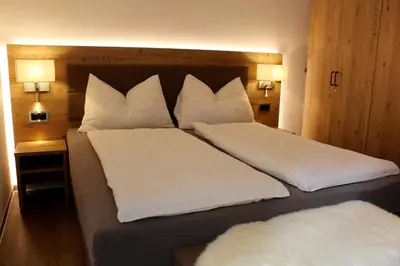 Ein Bett oder Betten in einem Zimmer der Unterkunft Haus Les Mélèzes C