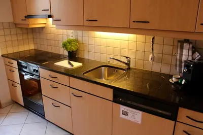 Küche/Küchenzeile in der Unterkunft Haus Les Mélèzes C