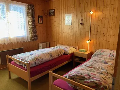 Ein Bett oder Betten in einem Zimmer der Unterkunft Chalet Bambi