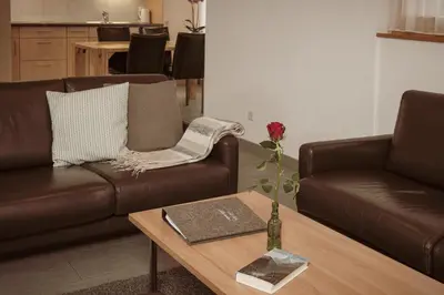 Ein Sitzbereich in der Unterkunft Haus Mischabel