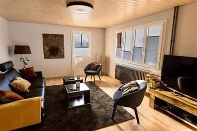 Ein Sitzbereich in der Unterkunft CHALET EGGLEN 