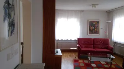 Ein Sitzbereich in der Unterkunft Royal 50