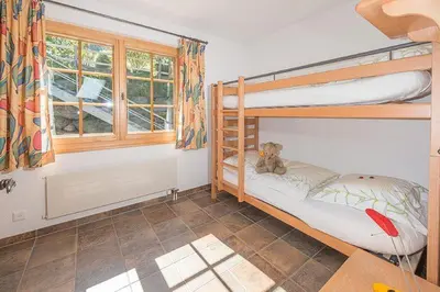 Ein Bett oder Betten in einem Zimmer der Unterkunft Försterli Ost