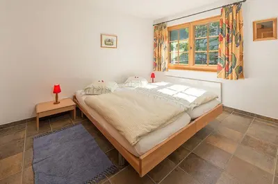 Ein Bett oder Betten in einem Zimmer der Unterkunft Försterli Ost
