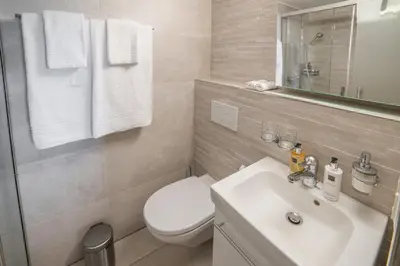 Ein Badezimmer in der Unterkunft Haus Andy