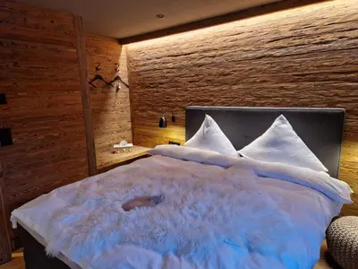 Ein Bett oder Betten in einem Zimmer der Unterkunft Boutique Lodge Spycher