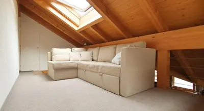 Ein Sitzbereich in der Unterkunft Apartment Honegg