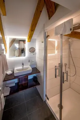 Ein Badezimmer in der Unterkunft Swiss Inn & Apartments