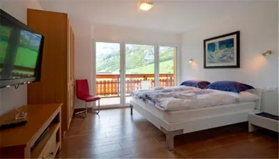 Ein Bett oder Betten in einem Zimmer der Unterkunft Residenz Ambassador B11