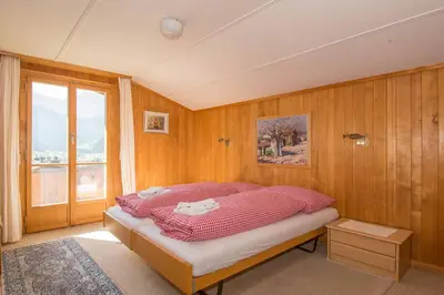Ein Bett oder Betten in einem Zimmer der Unterkunft Buchhüttli