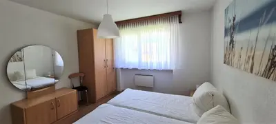 Ein Bett oder Betten in einem Zimmer der Unterkunft Lorée 201