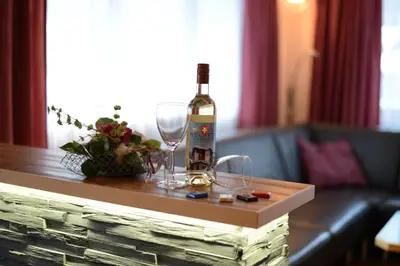 Getränke in der Unterkunft Helvetia Apartments