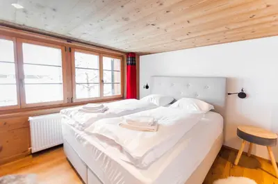 Ein Bett oder Betten in einem Zimmer der Unterkunft Chic Alpine Apartment for 5 - Perfect for skiers