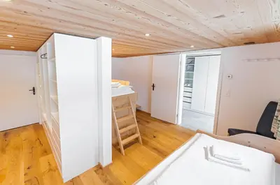 Ein Bett oder Betten in einem Zimmer der Unterkunft Chic Alpine Apartment for 5 - Perfect for skiers