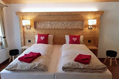 Ein Bett oder Betten in einem Zimmer der Unterkunft Guggerzyt