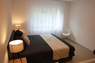 Ein Bett oder Betten in einem Zimmer der Unterkunft Villa Parasana