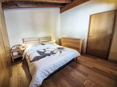 Ein Bett oder Betten in einem Zimmer der Unterkunft Chalet Chalet Aglaia by Interhome
