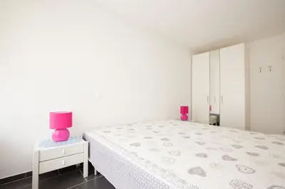 Ein Bett oder Betten in einem Zimmer der Unterkunft Haus Fortuna