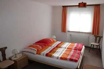 Ein Bett oder Betten in einem Zimmer der Unterkunft Haus Amara