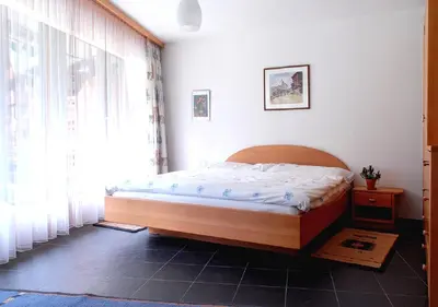 Ein Bett oder Betten in einem Zimmer der Unterkunft Studio Superior Brunnmatt