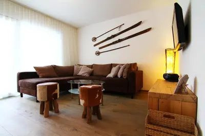 Ein Sitzbereich in der Unterkunft Amor Lodge