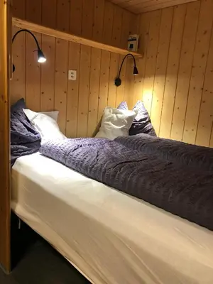 Ein Bett oder Betten in einem Zimmer der Unterkunft Chalet Weidli