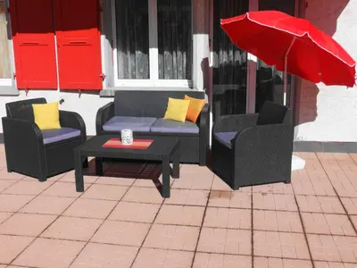 Ein Sitzbereich in der Unterkunft Domblick Apartments