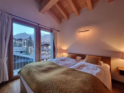 Ein Bett oder Betten in einem Zimmer der Unterkunft Haus Serac
