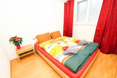 Ein Bett oder Betten in einem Zimmer der Unterkunft Central Park Holiday apartment