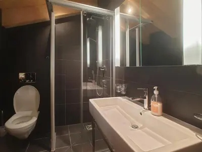 Ein Badezimmer in der Unterkunft Aramis Penthouse