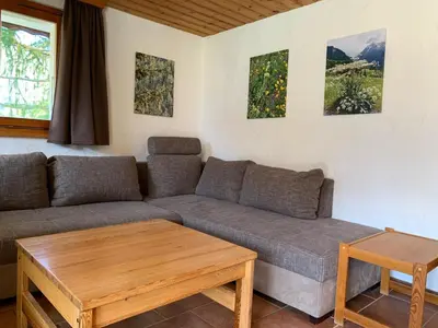 Ein Sitzbereich in der Unterkunft Chalet Victoria