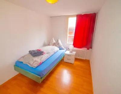 Ein Bett oder Betten in einem Zimmer der Unterkunft Sunny Day Holiday Apartment