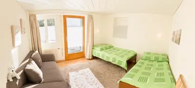 Ein Bett oder Betten in einem Zimmer der Unterkunft Chalet Heimetli