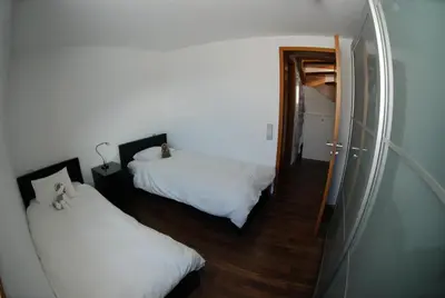 Ein Bett oder Betten in einem Zimmer der Unterkunft Ayoba